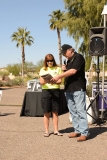 Beth Bacher accepts HealthSouth plaque