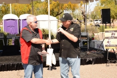 Mayor Jerry Weiers accepts plaque