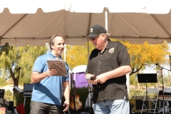 Mark Breyer accepts plaque